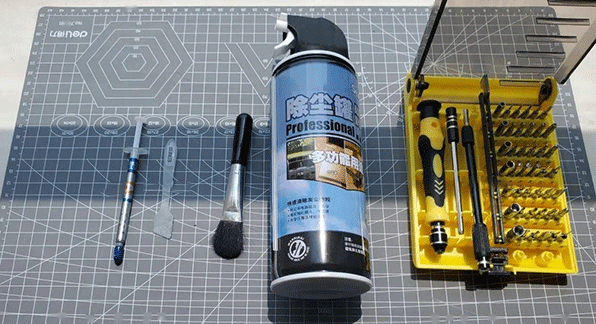 tools for notebook fan cleaning, such as brush, compressed air can